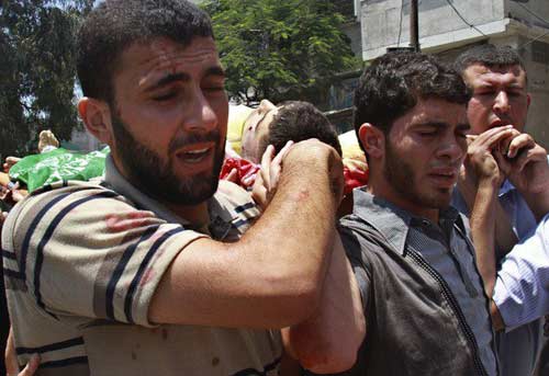 Un combattant Qassam tué et trois citoyens blessés dans un bombardement des forces d'occupation sur Gaza-ville