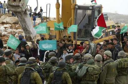 Des palestiniens blessés, des pacifistes israéliens et internationaux détenus après une manifestation nonviolente à Hebron